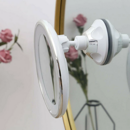 10x magnifying mirror attached to a mirror